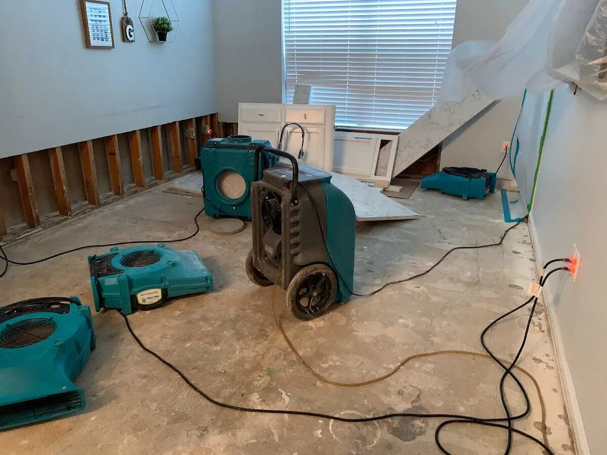 Dehumidifier in flood-cut room for Water Damage Restoration in Vineyard